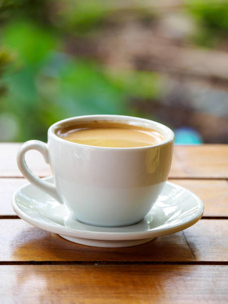 istock Hot coffee americano on the old wooden table 1220281671