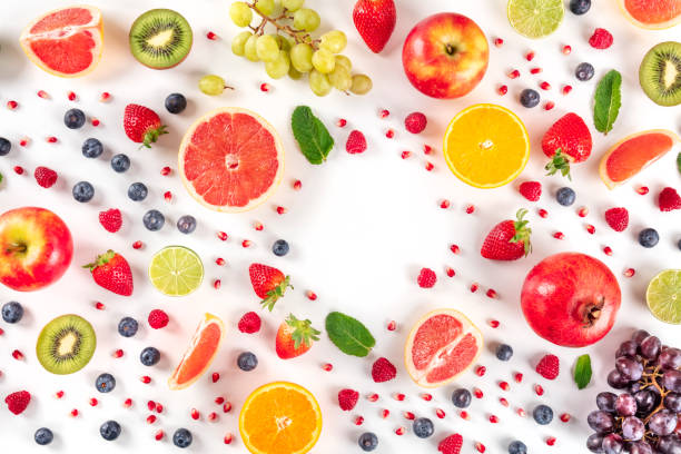 istock Fresh summer fruit design, a flat lay on a white background with a place for text, vibrant food pattern, shot from the top 1220283183