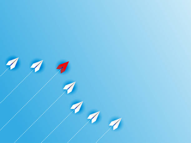 istock Change Group of paper plane change disruptive  in one direction and with one individual pointing in the different way. 1220284933