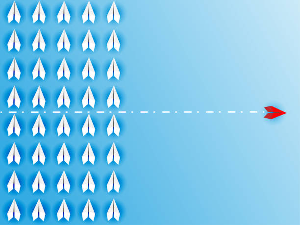 istock Change Group of paper plane change disruptive  in one direction and with one individual pointing in the different way. 1220285077