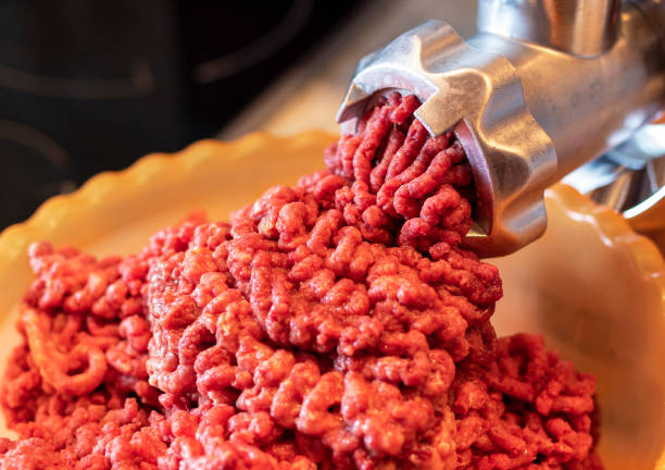 chopped raw meat. minced meat for cooking - meat grinder ground beef meat imagens e fotografias de stock