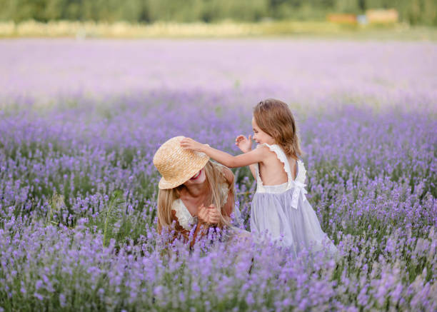 istock portrait of two sisters in a lavender 1220288129