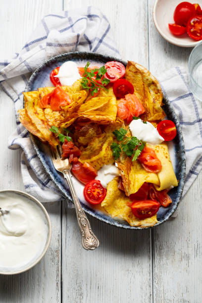 istock Breakfast pancake with salmon on white rustic table, homemade food 1220288273