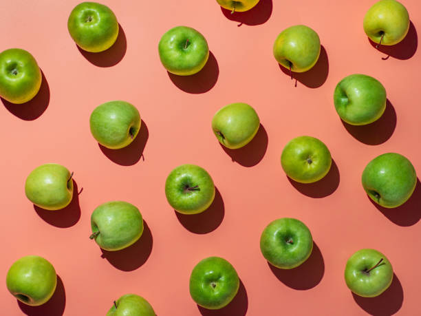 istock Bright backgroud with apples, copy space in center 1220289370