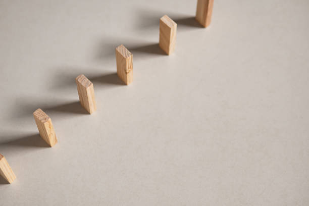 istock Wooden blocks placed in a row 1220289635
