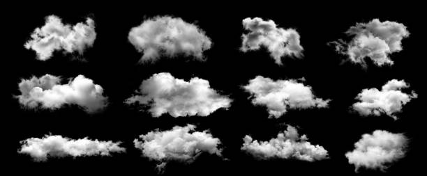 istock Set of white clouds isolated on black background. 1220289659