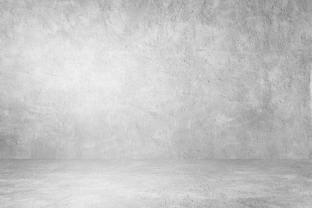 istock Studio room of Plaster cement concrete wall texture background. for interior design and product showing. 1220289802