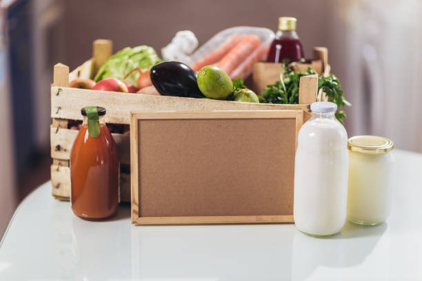 istock Fresh organic groceries in a wooden box. 1220291991