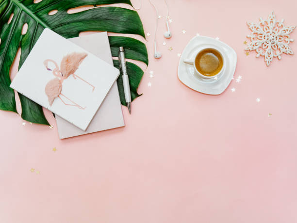 istock Pink creative Woman background. Notebook, keyboard, coffee. Flat lay 1220294863
