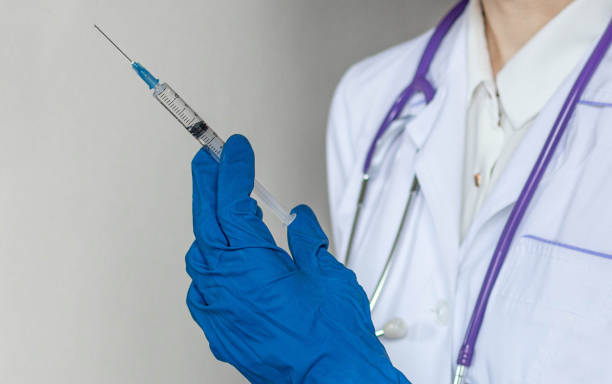 istock Male Doctor take pills, tablets and writing prescription selective focus 1220297995