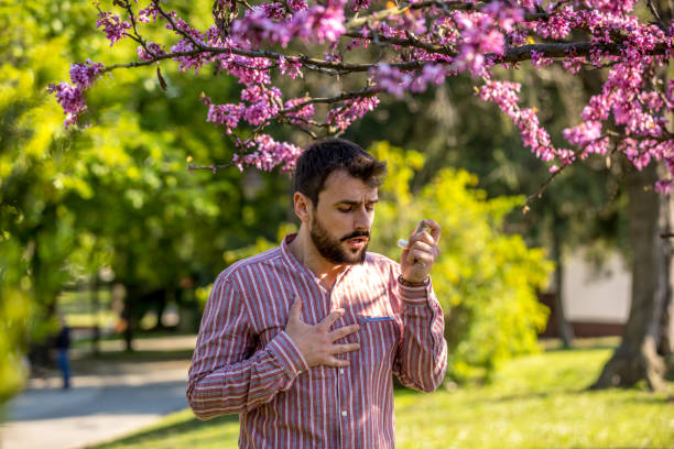 istock Man is using an asthma inhale 1220300750