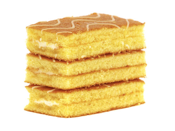 istock Sponge cake bars with milk cream filling 1220302121