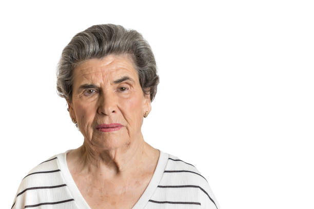 istock Senior woman representing group risk during pandemic 1220303083