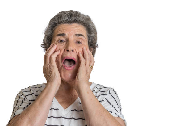 istock Astonished senior female with opened mouth 1220303131