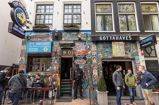 Amsterdam, Netherlands - April 20, 2017: The Bulldog coffee shop in the Red Light District of Amsterdam, Holland, the Netherlands