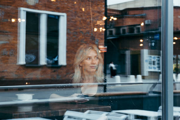 istock Businesswoman in a cafe 1220306387