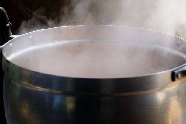 istock White smoke from a hot cooking pot in an style kitchen area 1220309777