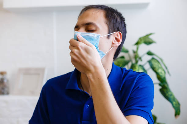 istock man wearing protective mask. coronavirus 2019-nCoV 1220310345