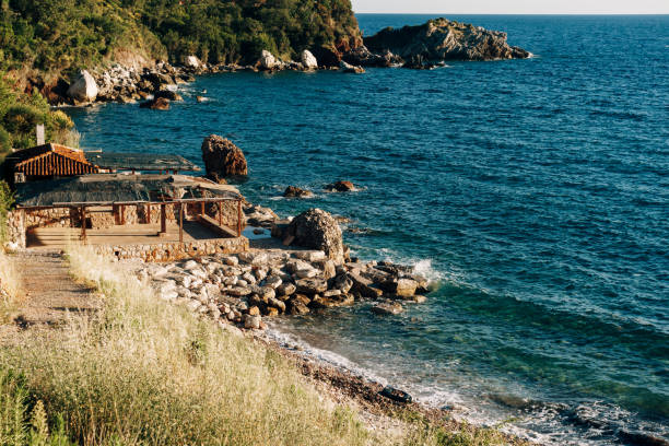 Cafe on a rocky sea shore in Montenegro. Deserted beach