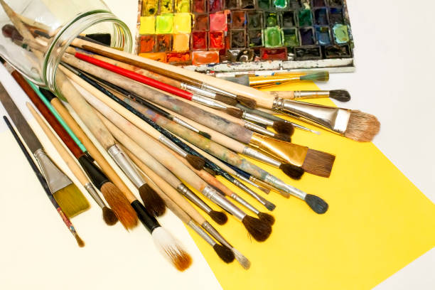 istock Artistic watercolors and brushes. 1220312549