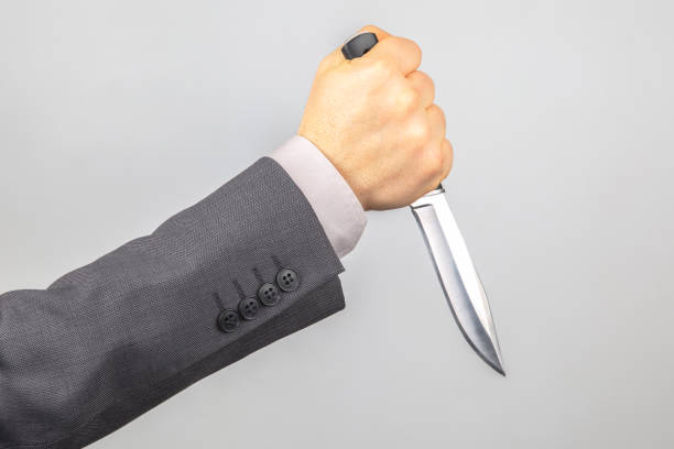istock knife in the hands of a man 1220314338