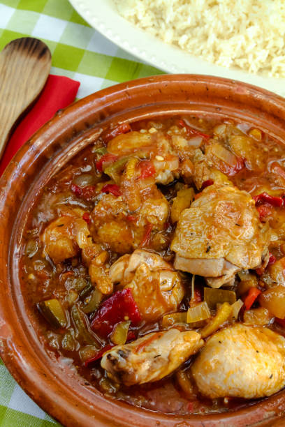 istock chicken dish with onions and peppers and rice 1220315071