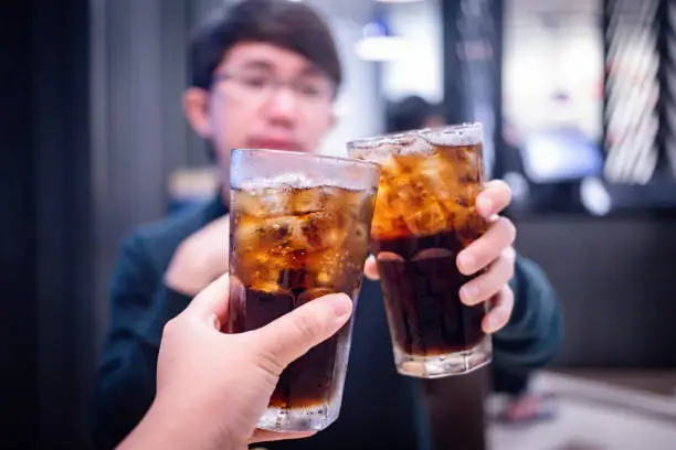 Photo of Man drinking soft drink