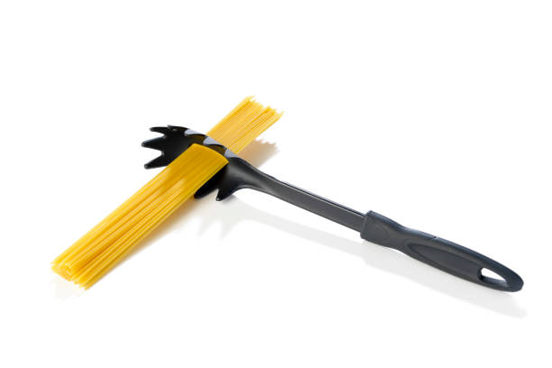 Single human hand holding  Kitchen tools: Pasta Server, Isolated on White Background