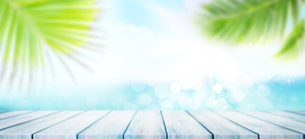 istock Summer sea with empty table, palm and sunny sky 1220321352
