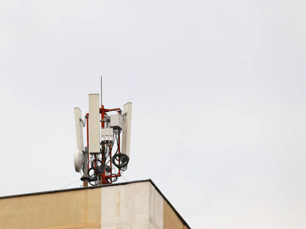 istock Radio tower with antennas on a blue sky background. Metal construction. Wireless network. Transmit tv radio signal. Egology of the environment. Information digitalization and high technology 1220321909