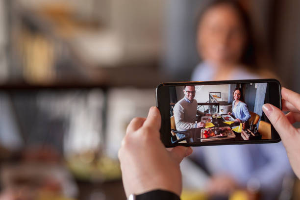 istock Couple being photographed during lunch in restaurant 1220325092