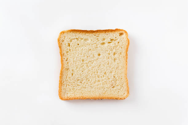 istock Slices toast bread isolated on white background. Top view, flat lay 1220328469