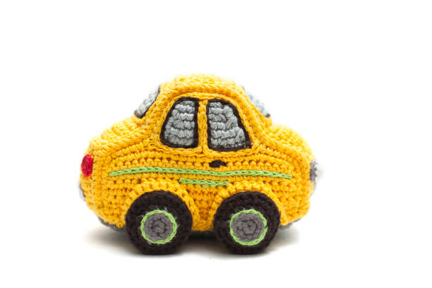 istock Small knitted yellow baby car 1220328488