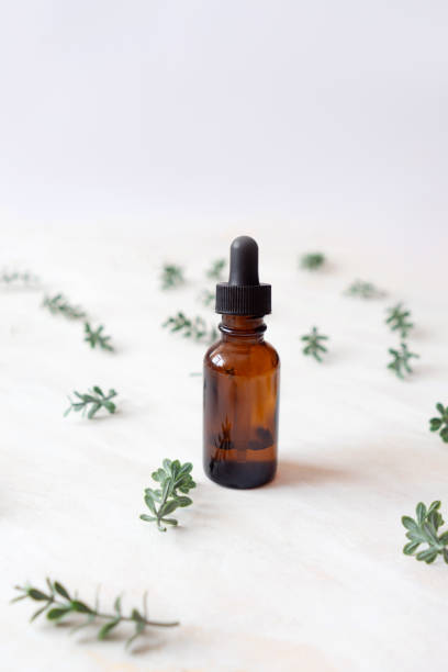 istock Front view of bottle with pipette 1220328574