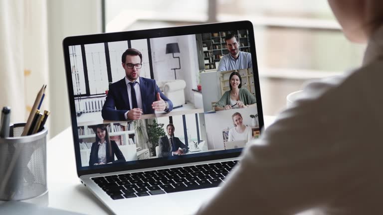 Remote employee conferencing boss and coworkers in online virtual chat