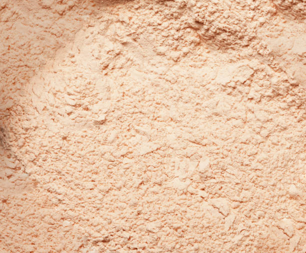 istock Background filled with foundation powder. 1220330693