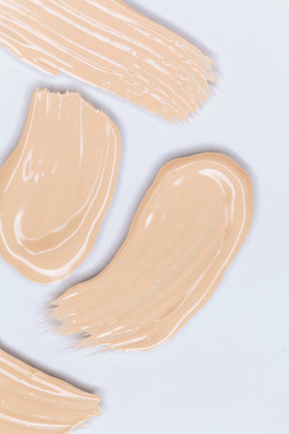 istock Makeup foundation smudges isolated on white background 1220331423