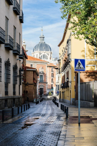 Madrid, Spain - November 1, 2019: View of empty street in Central Madrid. Sacramento street in historic centre in Madrid de los Austrias quarter