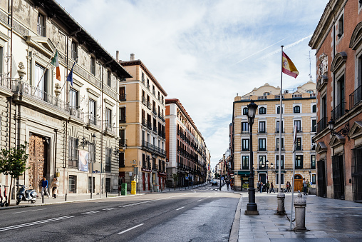 Madrid, Spain - November 1, 2019: View of empty street in Central Madrid. Mayor Street is located in Madrid de los Austrias quarter