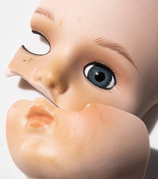 istock Broken China Doll Face and Head Close Up 1220332998