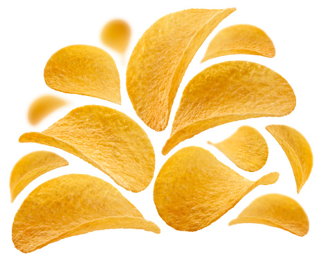 Potato chips levitate on a white background.