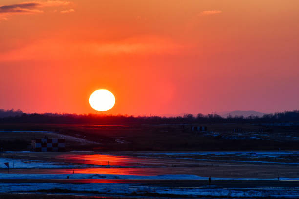 istock Sunset on the airport runway 1220342191