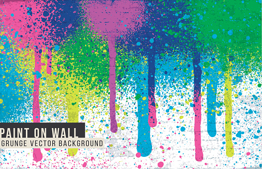 Vector background made of spray paint splatters and smears of paint over a wall texture. Layered file for easy editing.