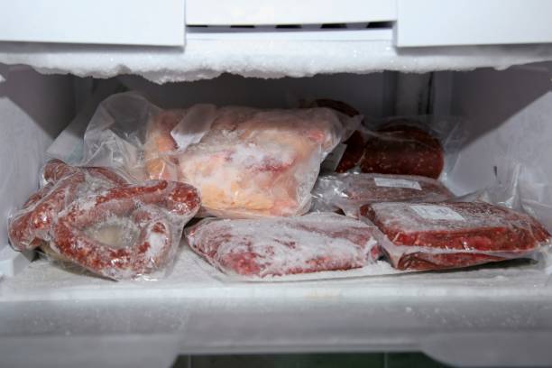 Frozen meat which has been vacuum sealed and placed inside a fridge freezer. Frozen meat which has been vacuum sealed and placed inside a fridge freezer. meat in fridge stock pictures, royalty-free photos & images