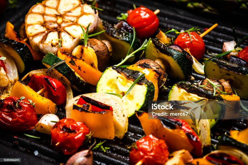 BBQ Grilled Wegetables on Skewers with Fresh Herbs and Spices. Summer Barbecue Food BBQ Grilled Wegetables on Skewers with Fresh Herbs and Spices. Summer Barbecue Food. Barbecue Grill Stock Photo