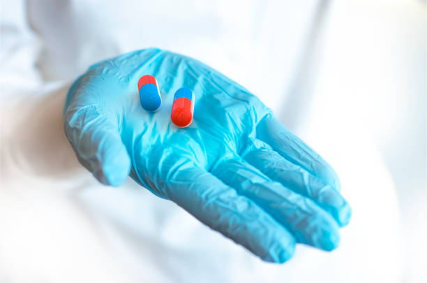 Antiviral pills on a doctor's hand. Shallow DOF. 3d illustration stock photo