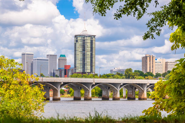 Tulsa, Oklahoma, USA Skyline Tulsa, Oklahoma, USA downtown skyline on the Arkansas River in the afternoon. tulsa landmark stock pictures, royalty-free photos & images