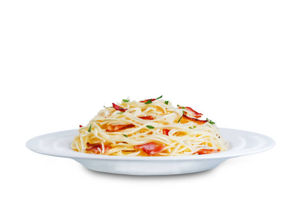 istock Bacon garlic parsley pasta on a white isolated background 1220352103