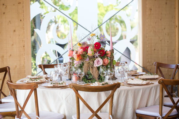 istock indoor restaurant table with bouquet of flowers 1220352662