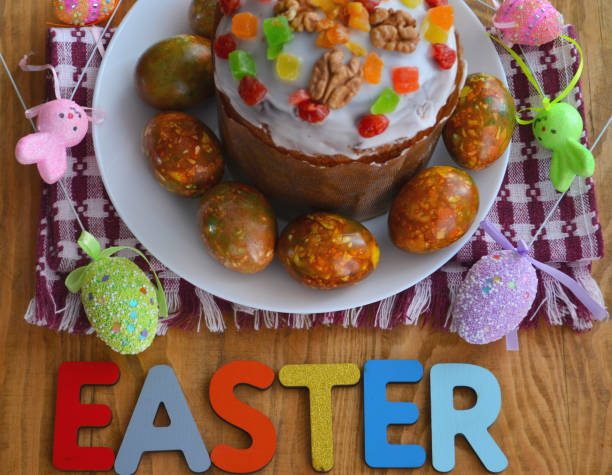 easter cake and eggs, close up. virus protection. quarantine for easter. the concept of the celebration of holy easter 2020 during the coronavirus pandemic. - mask religious celebration horizontal easter imagens e fotografias de stock